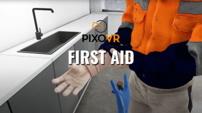 A worker performing first aid on their coworker