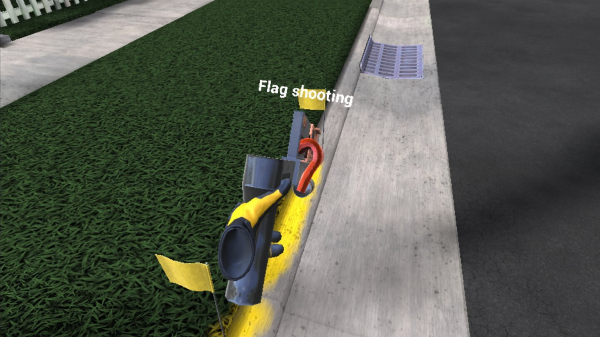 A worker painting the curb for gas line marking