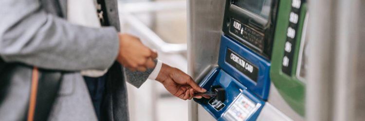 Someone using an ATM