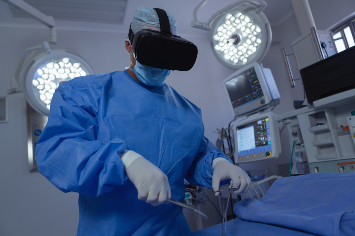 A surgeon using VR to perform surgery