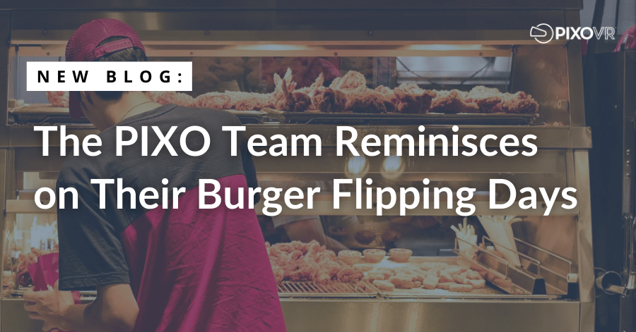 A fast food workers back facing you with food in front of him